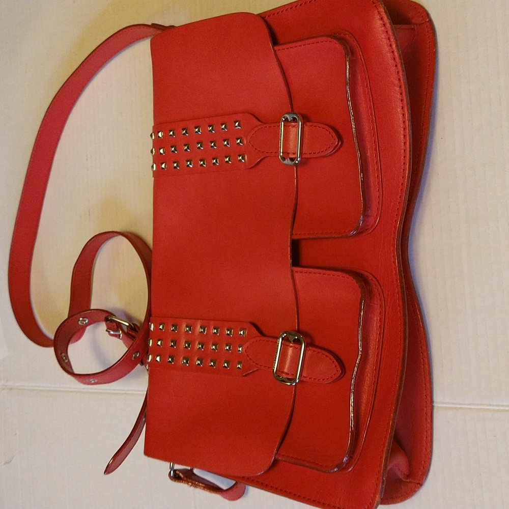 VGUC. Rebecca Minkoff silver studded red leather saddle bag.